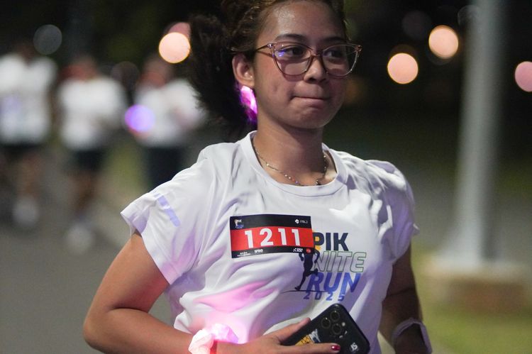 Race photo from PIK NITE RUN VIBES