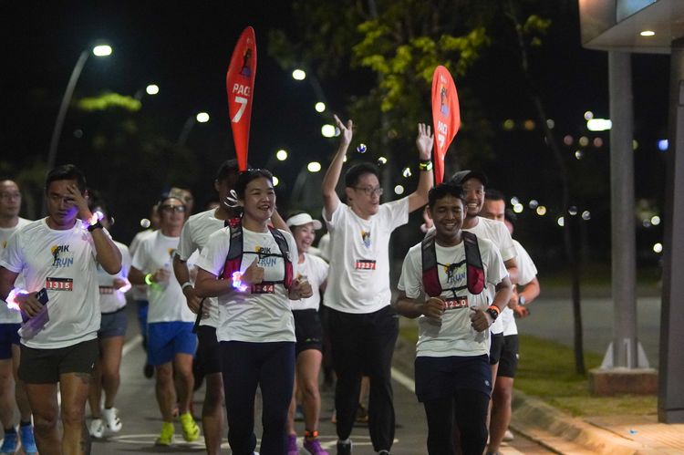 Race photo from PIK NITE RUN VIBES