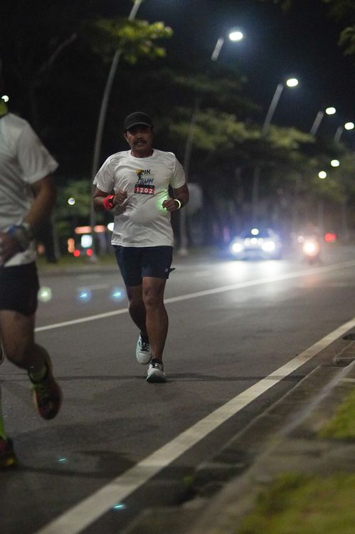 Race photo from PIK NITE RUN VIBES