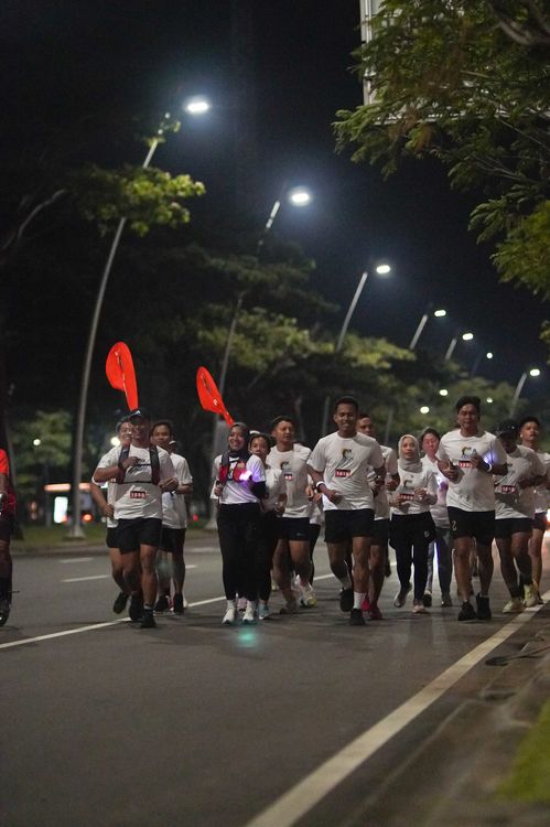 Race photo from PIK NITE RUN VIBES