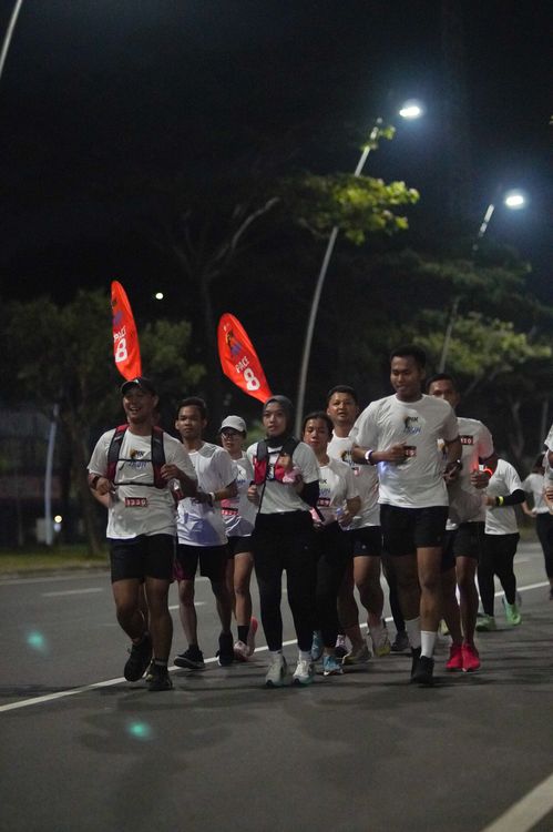 Race photo from PIK NITE RUN VIBES