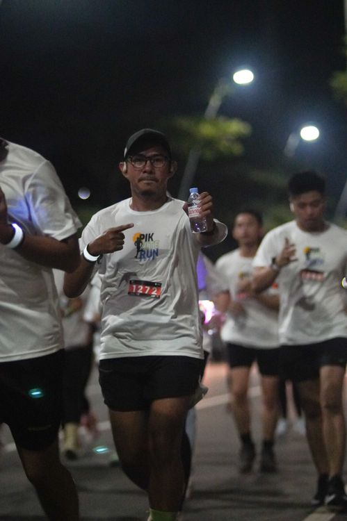 Race photo from PIK NITE RUN VIBES