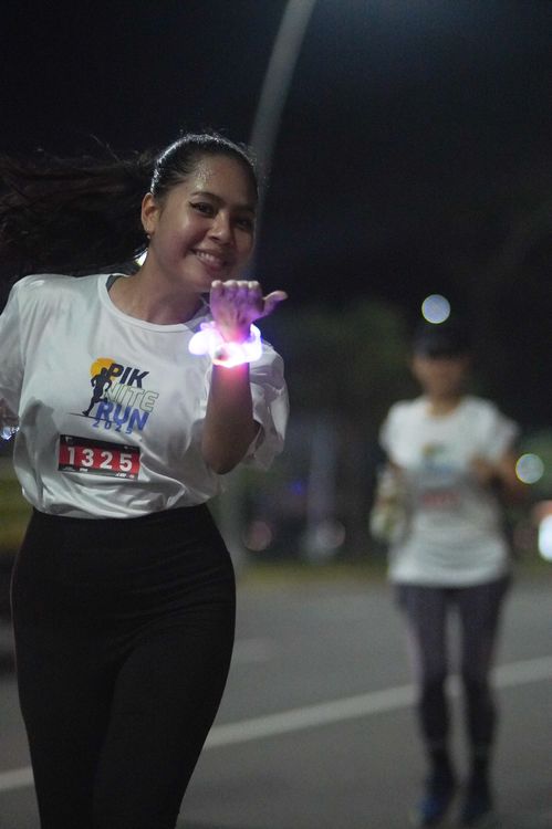 Race photo from PIK NITE RUN VIBES