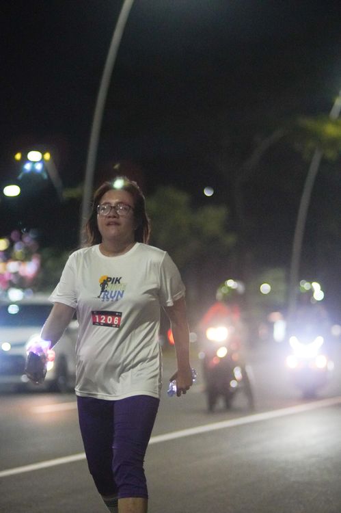 Race photo from PIK NITE RUN VIBES