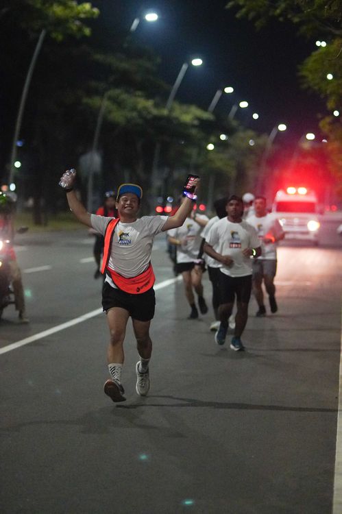 Race photo from PIK NITE RUN VIBES