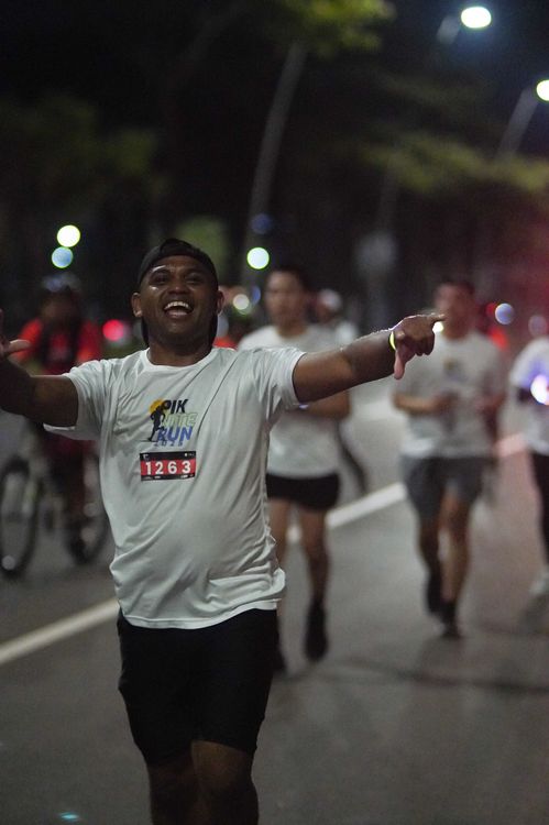Race photo from PIK NITE RUN VIBES