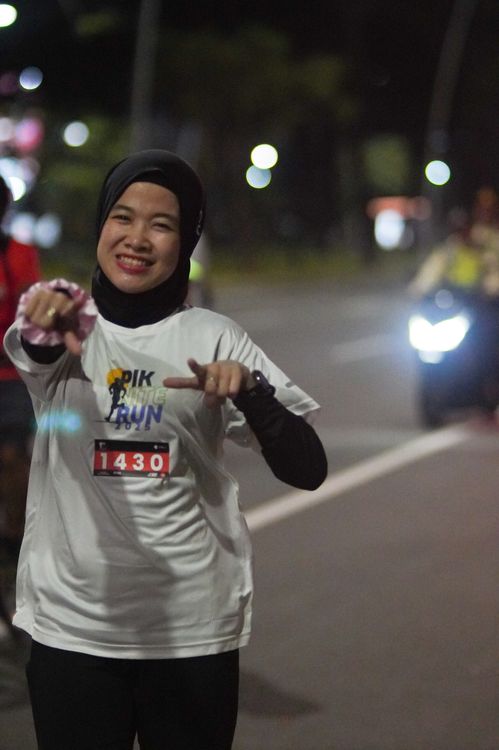 Race photo from PIK NITE RUN VIBES
