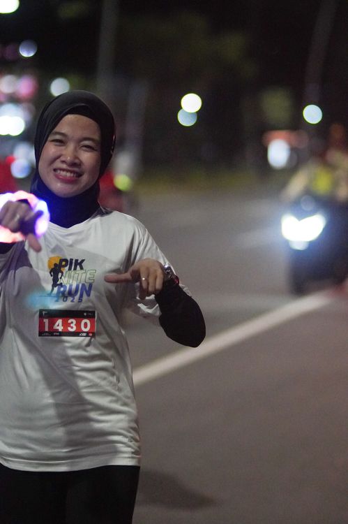 Race photo from PIK NITE RUN VIBES