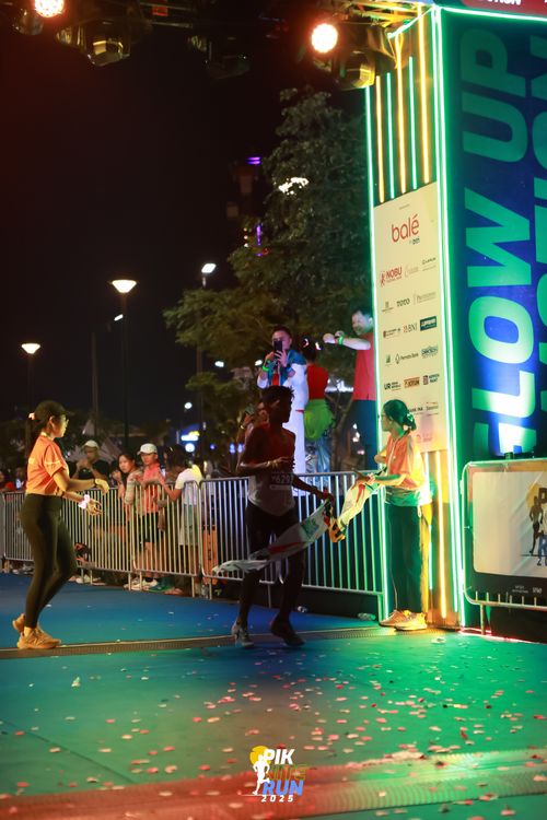 Race photo from PIK NITE RUN 2025