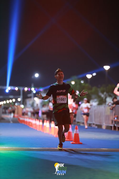 Race photo from PIK NITE RUN 2025