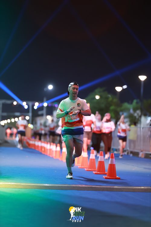 Race photo from PIK NITE RUN 2025