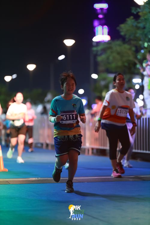 Race photo from PIK NITE RUN 2025
