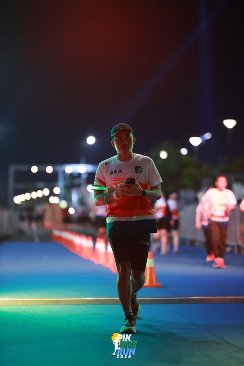 Race photo from PIK NITE RUN 2025