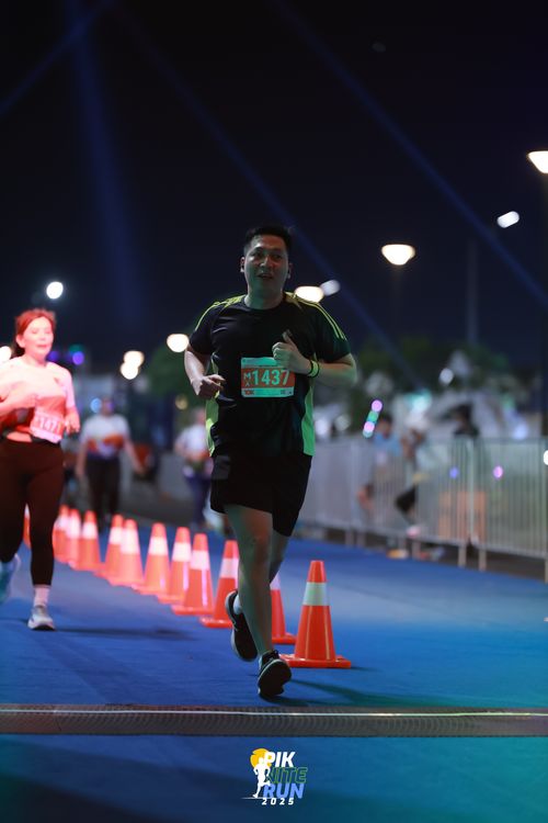 Race photo from PIK NITE RUN 2025