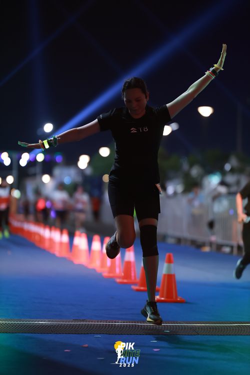 Race photo from PIK NITE RUN 2025