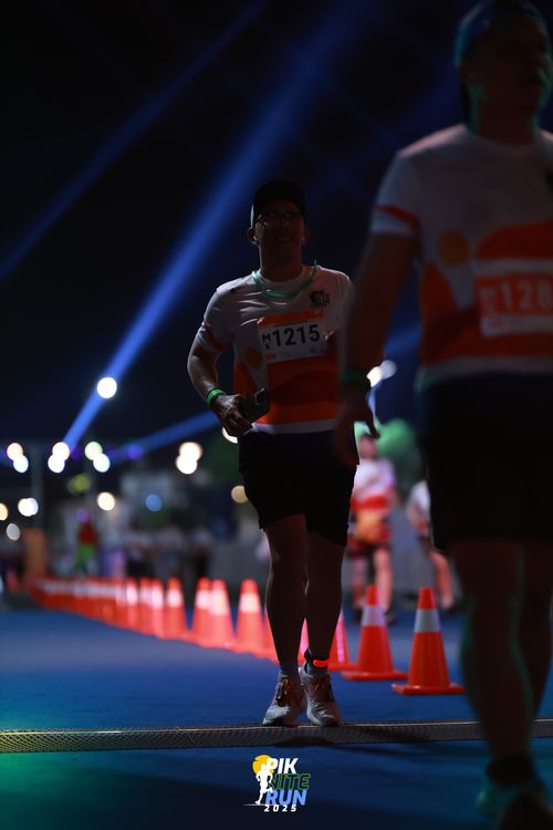 Race photo from PIK NITE RUN 2025