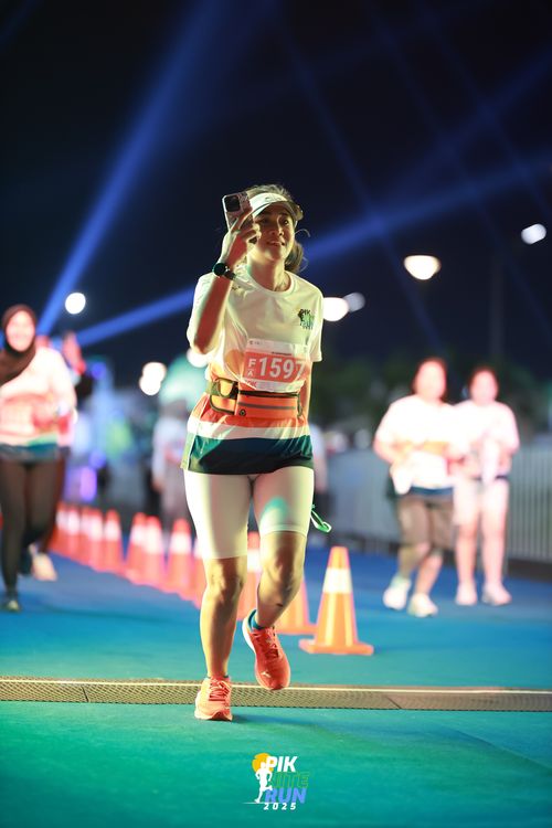 Race photo from PIK NITE RUN 2025