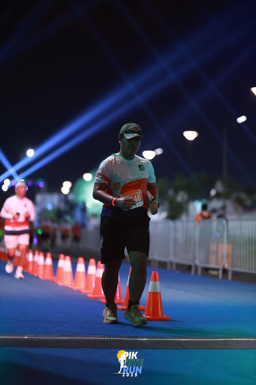 Race photo from PIK NITE RUN 2025