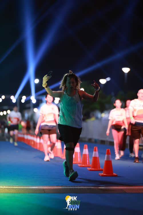 Race photo from PIK NITE RUN 2025