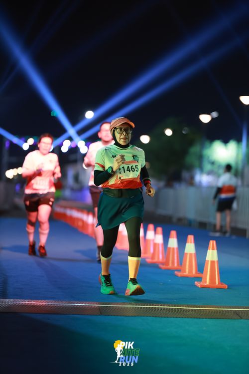 Race photo from PIK NITE RUN 2025