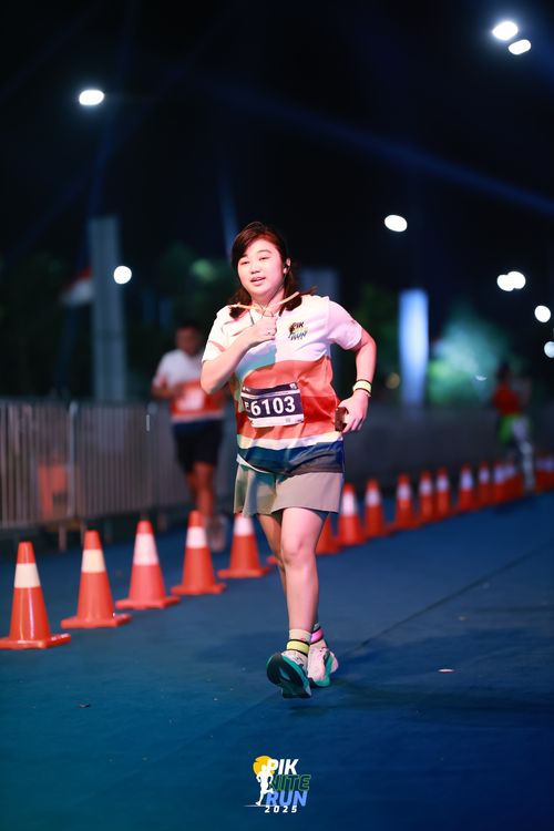 Race photo from PIK NITE RUN 2025