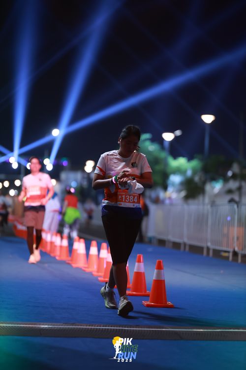 Race photo from PIK NITE RUN 2025