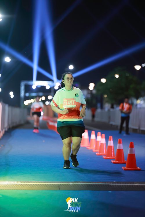 Race photo from PIK NITE RUN 2025