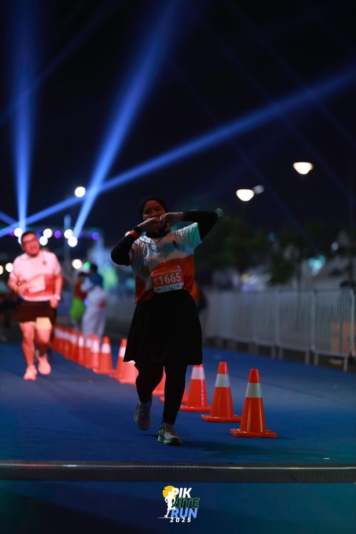 Race photo from PIK NITE RUN 2025