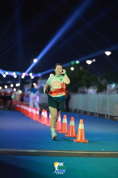 Race photo from PIK NITE RUN 2025
