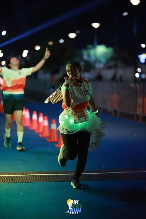 Race photo from PIK NITE RUN 2025
