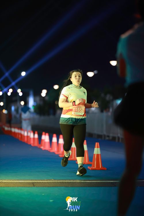 Race photo from PIK NITE RUN 2025