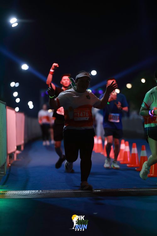 Race photo from PIK NITE RUN 2025