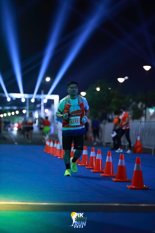 Race photo from PIK NITE RUN 2025