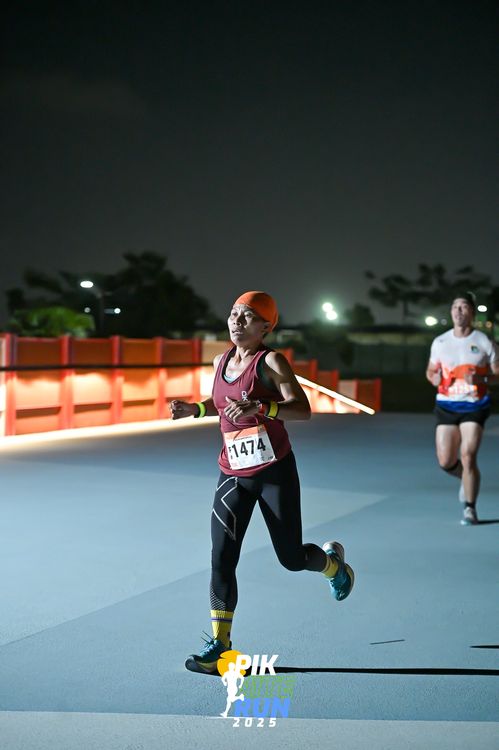 Race photo from PIK NITE RUN 2025