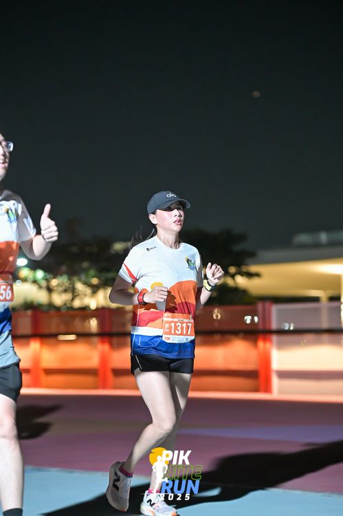 Race photo from PIK NITE RUN 2025