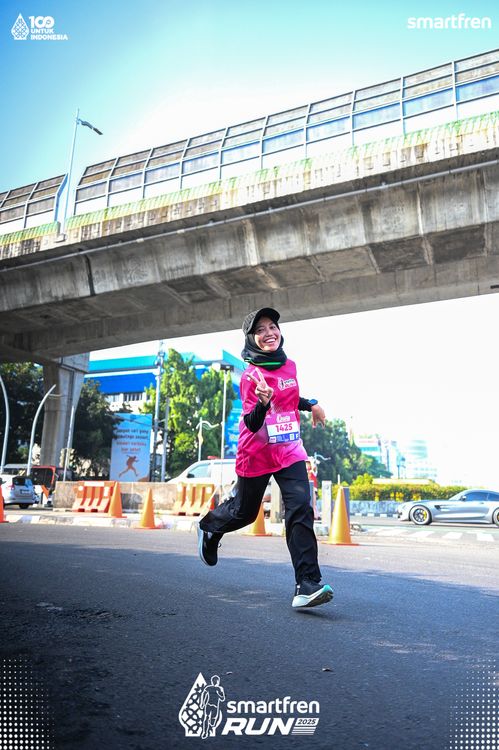 Race photo from Smartfren Run 2025 