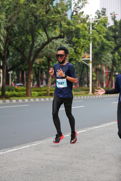 Race photo from KEMLU RUN 2025