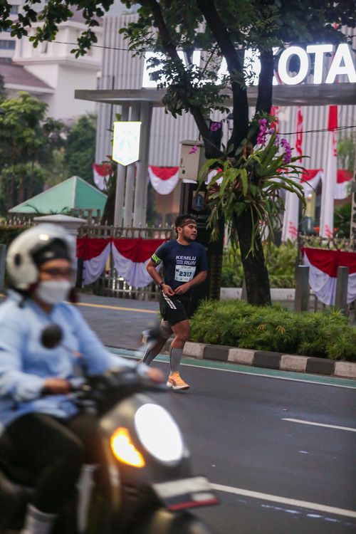 Race photo from KEMLU RUN 2025