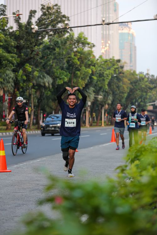 Race photo from KEMLU RUN 2025