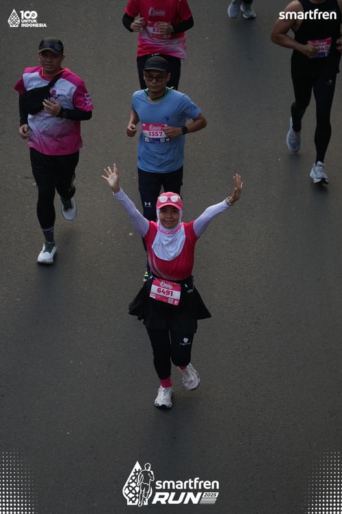 Race photo from Smartfren Run 2025 