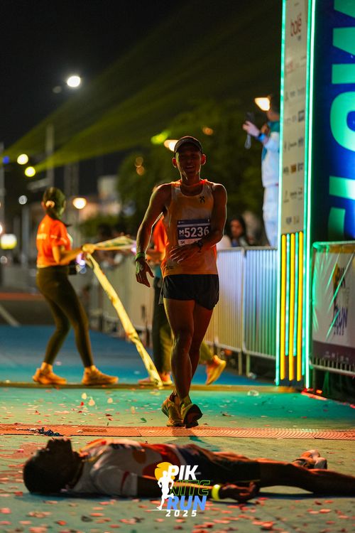 Race photo from PIK NITE RUN 2025