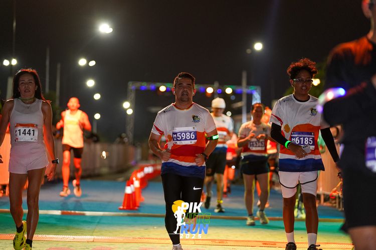 Race photo from PIK NITE RUN 2025