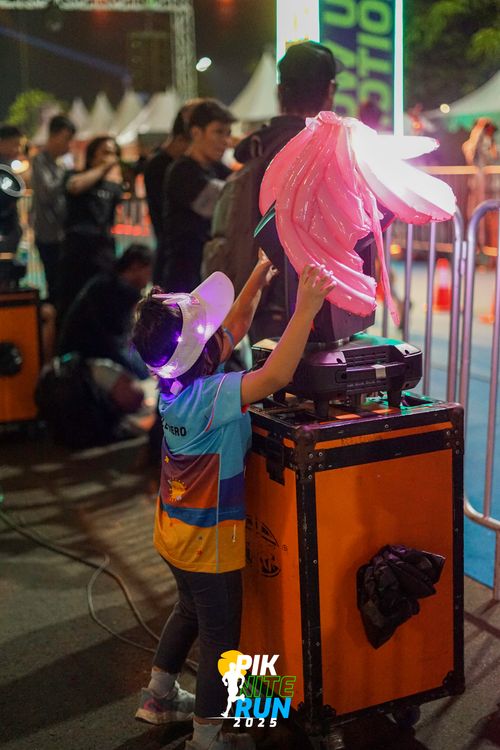 Race photo from PIK NITE RUN 2025