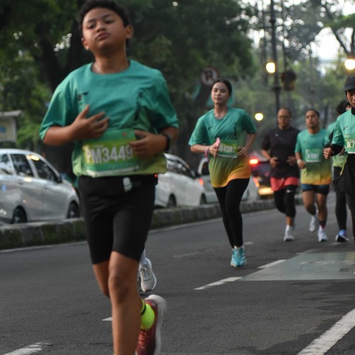 Race photo from BAUR RUN 2025