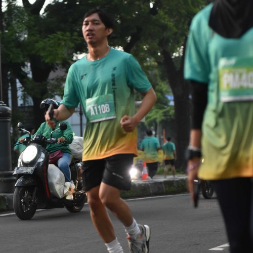 Race photo from BAUR RUN 2025