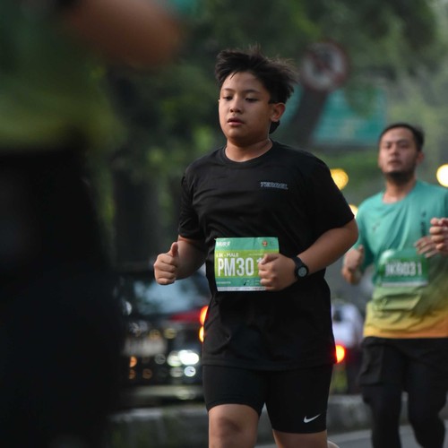 Race photo from BAUR RUN 2025