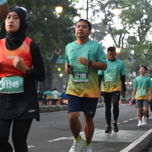Race photo from BAUR RUN 2025