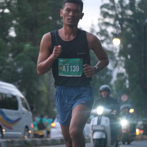 Race photo from BAUR RUN 2025
