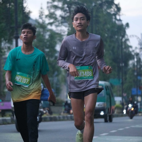 Race photo from BAUR RUN 2025