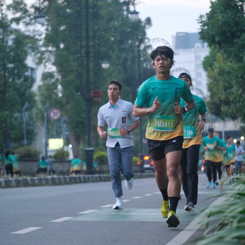 Race photo from BAUR RUN 2025
